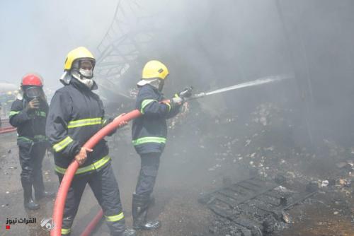 الدفاع المدني ينقذ عائلة من حريق في النجف