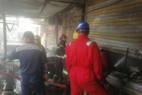 بالصور.. إخماد حريق داخل سوق شعبي في مدينة الصدر