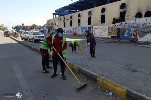 بالصور .. تنظيف ساحة التحرير ومحيط المطعم التركي والخلاني وسط بغداد