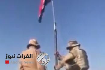 بالفيديو.. خلاف حاد بين الجيش والبيشمركة لرفع العلم العراقي في كفري