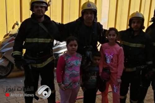 بالصور.. عملية انقاذ جريئة لامرأة وثلاثة أطفال في بغداد