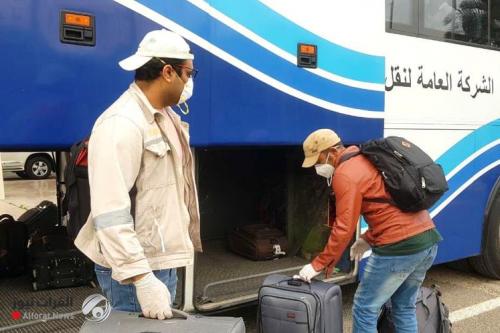 بالصور.. نقل عمال باكستانيين الى مطار بغداد لاجلائهم الى بلدهم