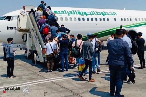 بالصور.. وصول 155 عراقياً عائدين من مصر برحلة استثنائية