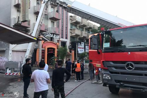 بالصور.. حريق في فندق أطلس بشارع السعدون